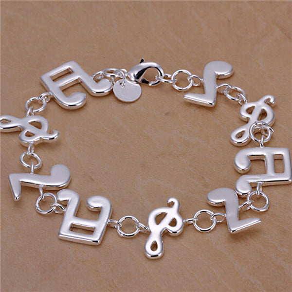 Musical ornaments bracelet 925 silver (plated) quality links &amp; lobster claw lock